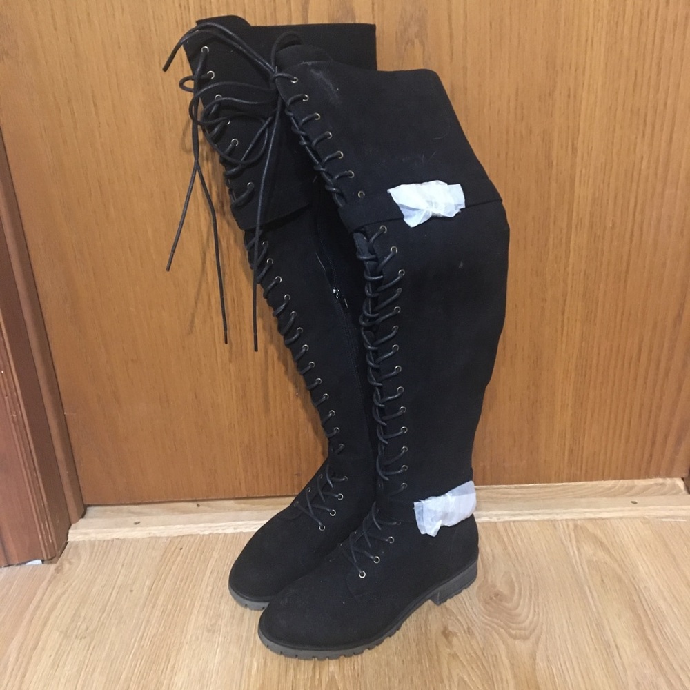 Over the knee lace up boots